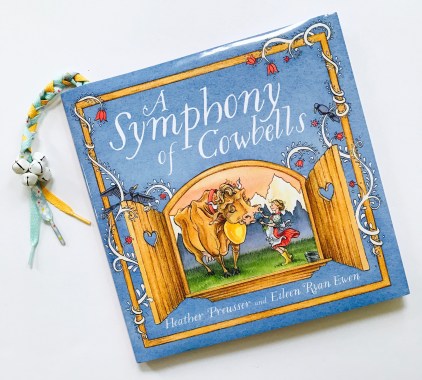 celebrate-picture-books-picture-book-review-bell-bookmark-a-symphony-of-cowbells