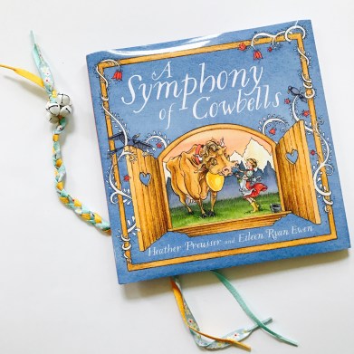 celebrate-picture-books-picture-book-review-bell-bookmark-a-symphony-of-cowbells